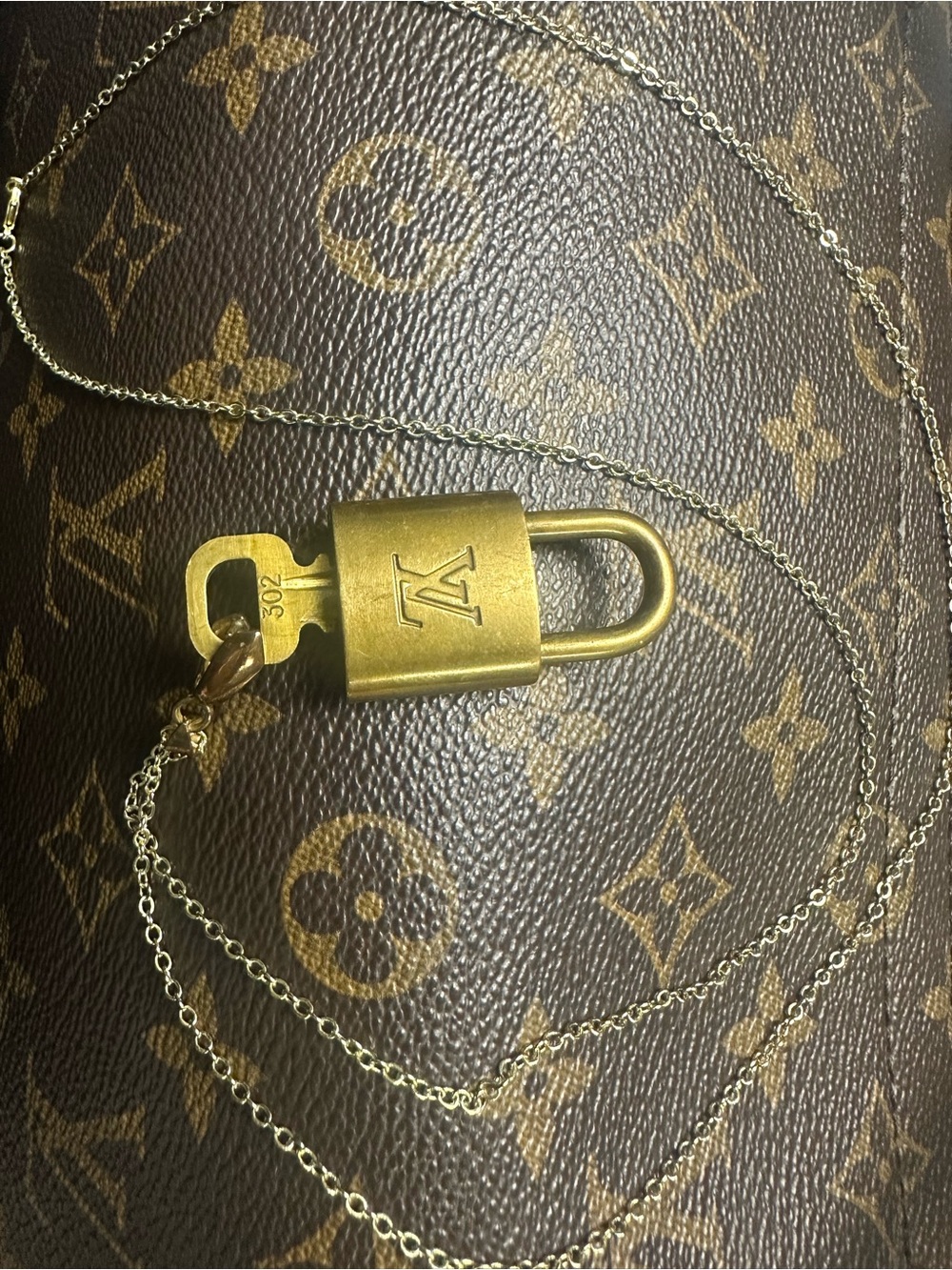 Louis Vuitton Gold Padlock Pendant with Key
